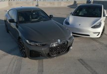 tesla model 3 vs Bmw i4.jpg tesla model 3 vs Bmw i4.jpg
